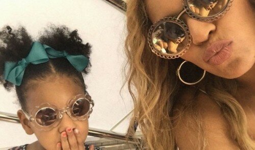 Beyonce reveals her assets in going down swimsuit & shares adorable holiday