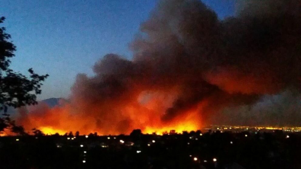 Higher humidity and lower temperatures helped pacify the fire that burned over Interstate 15 in a mountainous area 55 miles northeast of Los Angeles on Friday