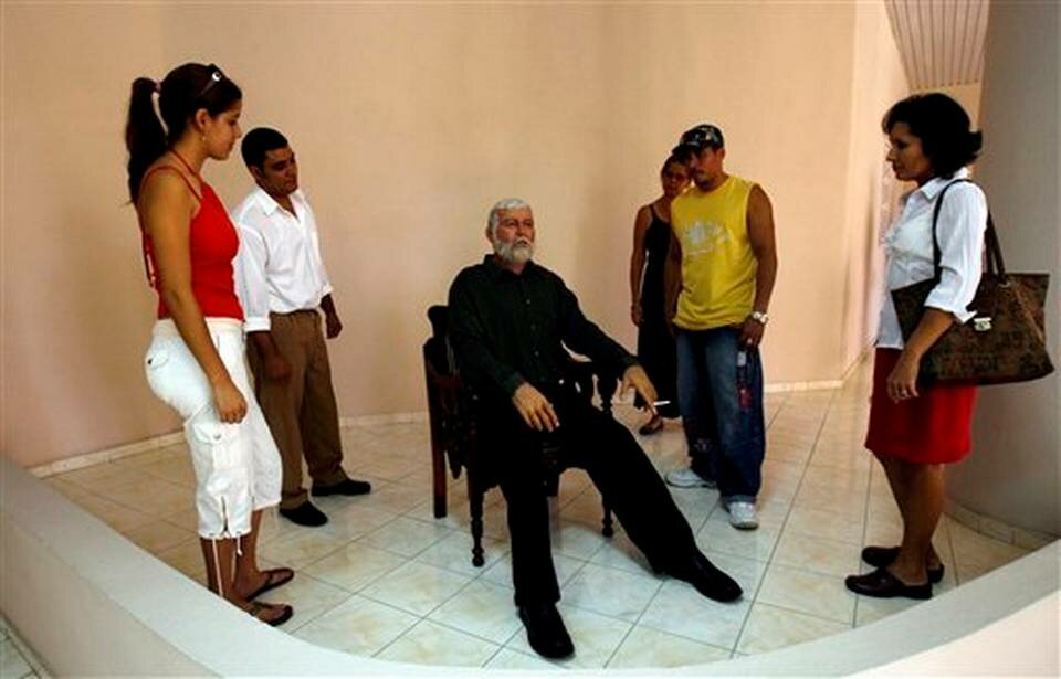 New era in ties begins as Cuba raises flag at embassy in US