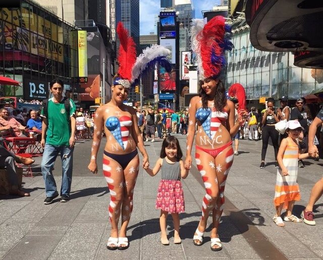 Woman Arrested After Attacking Times Square Desnuda photo