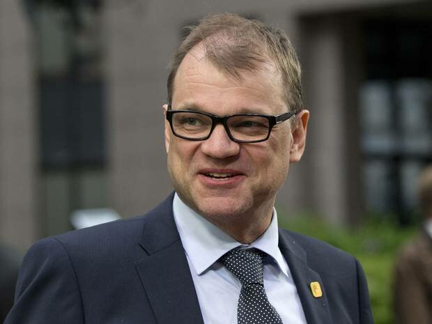 Finnish PM offers his home to refugees photo